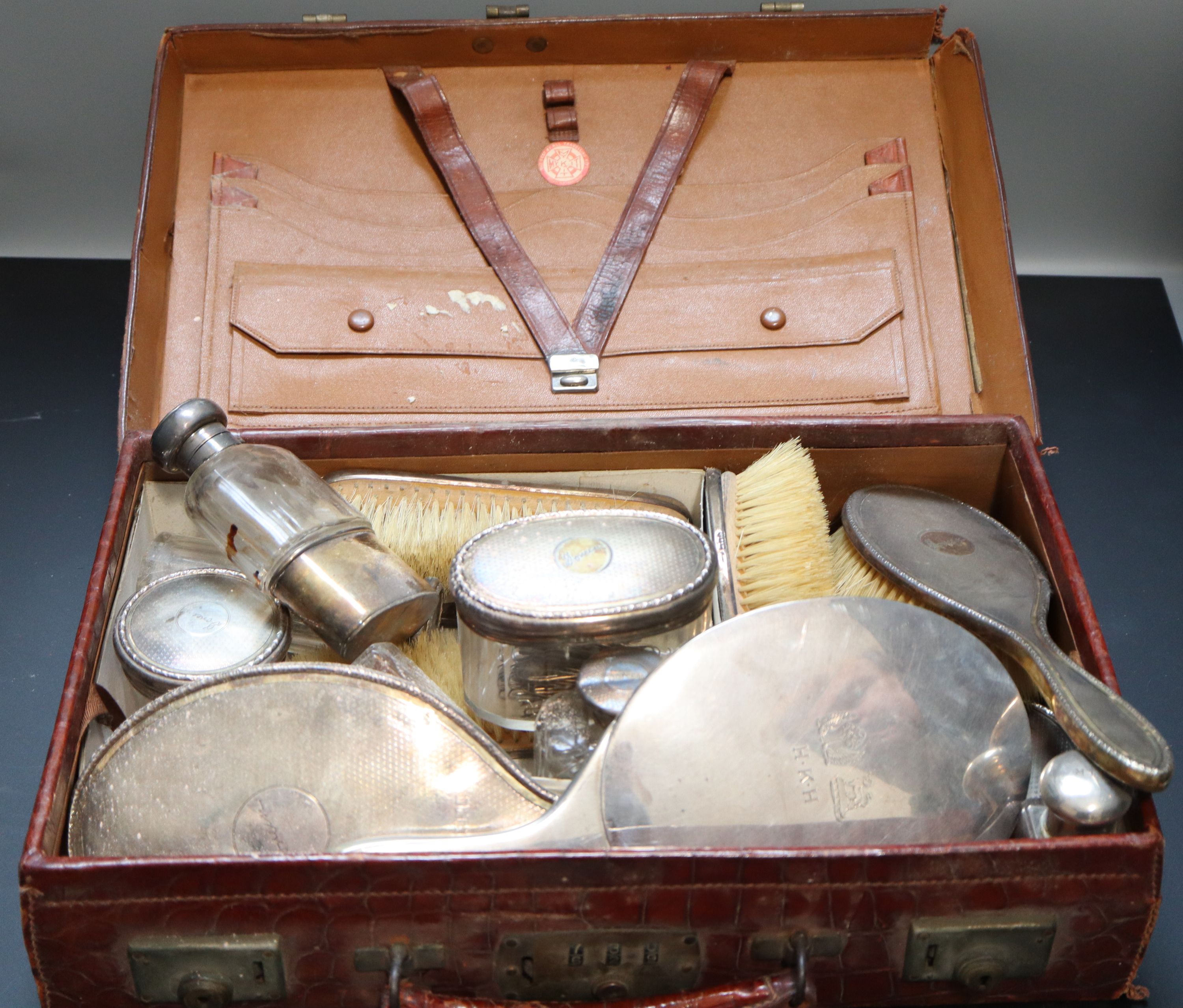 A matched 15 piece silver mounted toilet set etc.